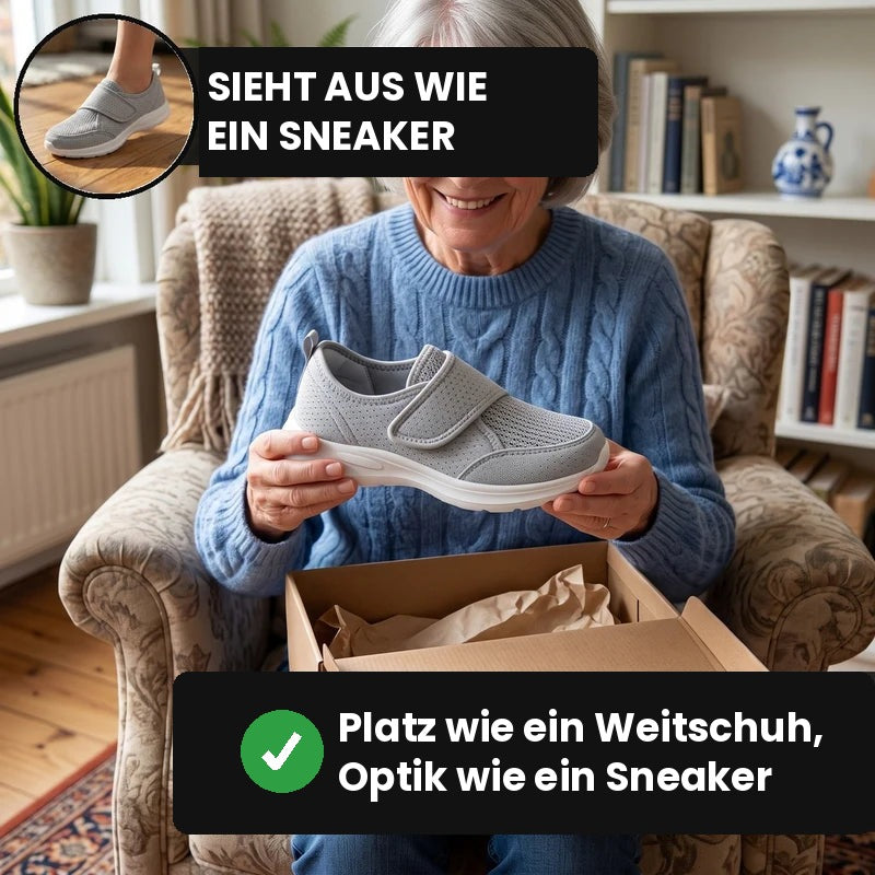 Ältere Frau im Sessel hält einen hellgrauen Breedevo Komfortschuh aus dem Paket