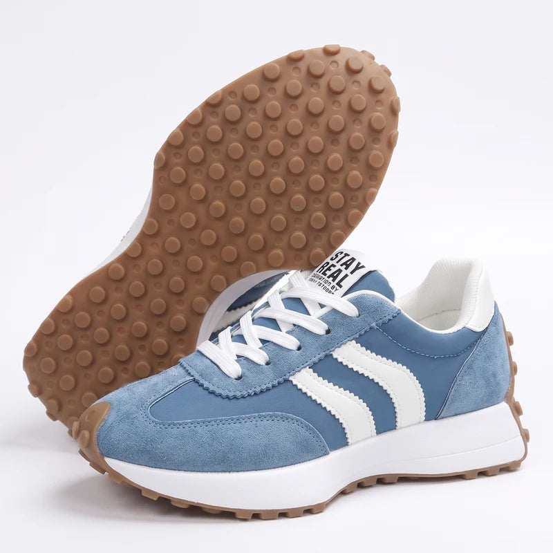 Fleureva Retro-Damensneaker in Blau, Seitenansicht mit Sohle