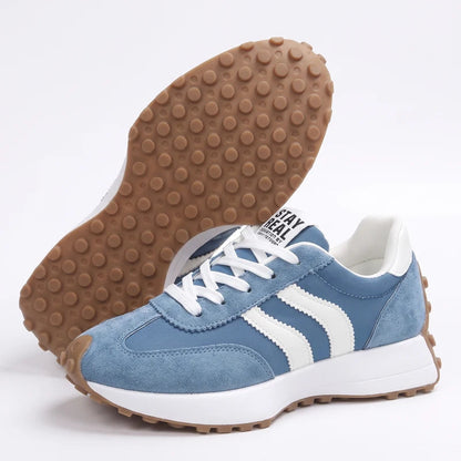 Fleureva Retro-Damensneaker in Blau, Seitenansicht mit Sohle