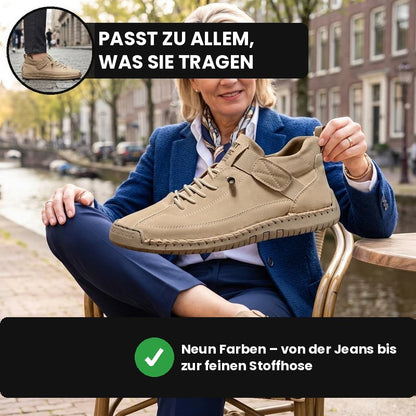Frau auf einer Terrasse an einer Gracht zeigt den MayFit Slip in Beige