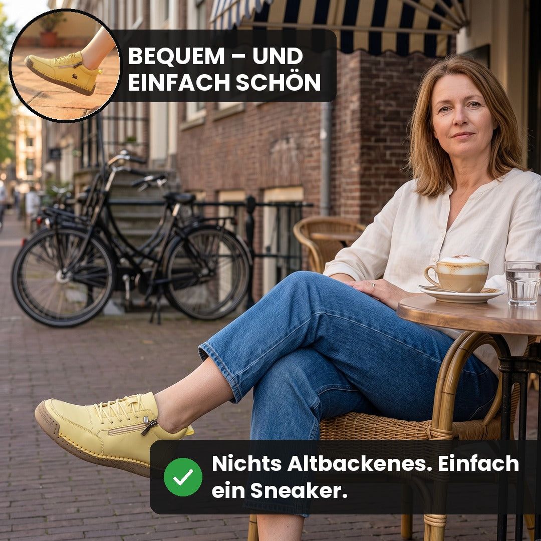 Frau im Straßencafé trägt den gelben MayFit Zip