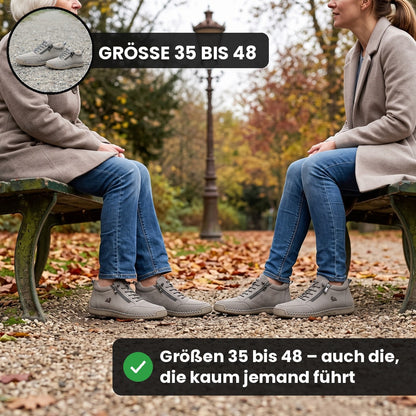 Zwei Frauen im Herbstpark tragen hellgraue MayFit Zip