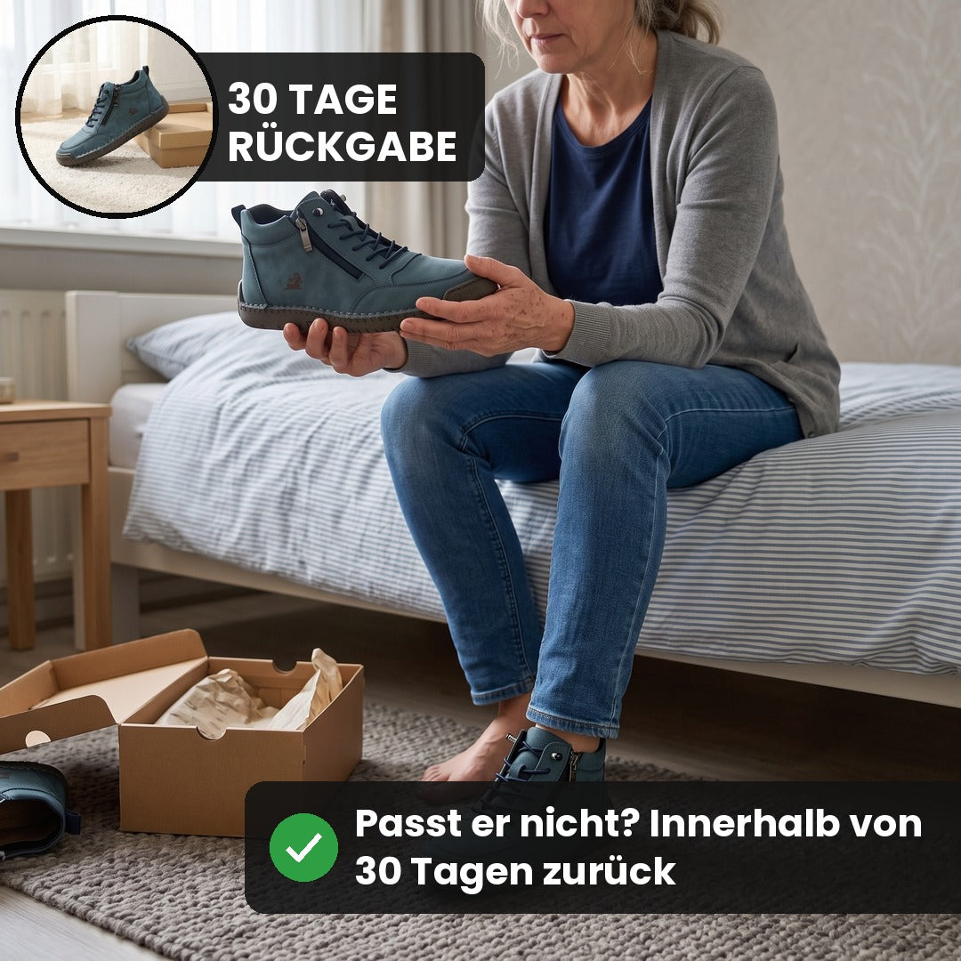 Frau auf dem Bett probiert den MayFit Zip in Petrol an
