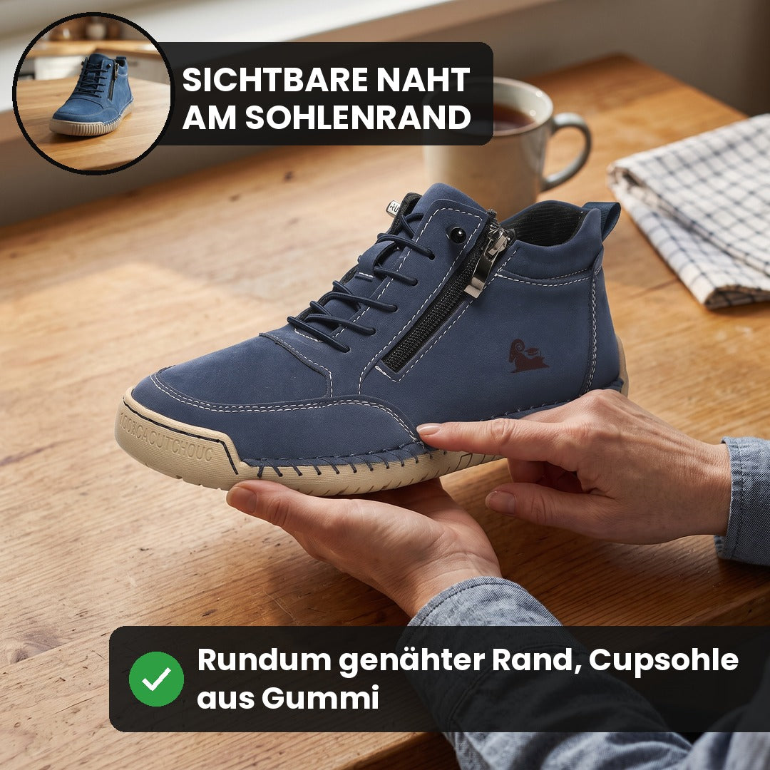 Hände zeigen die genähte Kante am blauen MayFit Zip