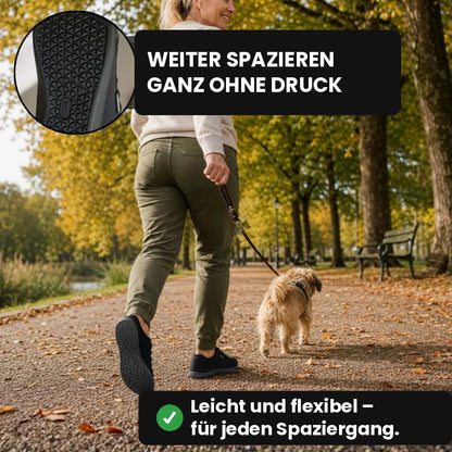 Frau mit Hund beim Herbstspaziergang in schwarzen Ruimevo® Sneakern, daneben die Laufsohle im Detail